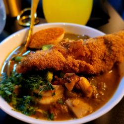 The SoulFood Lounge - New Orleans Gumbo Yakamein - Cajun fried perch, seafood savory gravy.  Very good