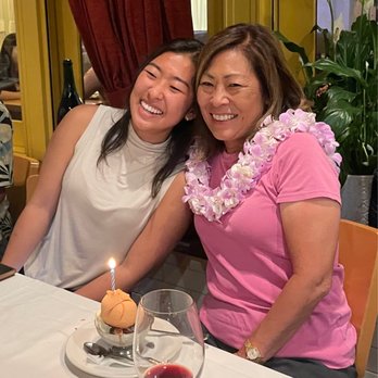 Flowers By Yip - A very happy birthday girl wearing a specialty, Hawaiian lei, designed by John Yip. - Florists Near Me - Santa Clara, California Flowers By Yip - A very happy birthday girl wearing a specialty, Hawaiian lei, designed by John Yip. - Florists Near Me - Santa Clara, California