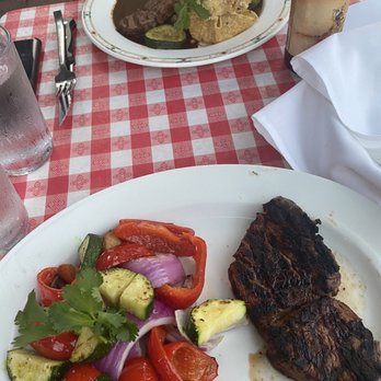 Mis Moles Restaurant - Carne asada with veggies and lamb in the back - Mexican Near Me - Chicago, Illinois Mis Moles Restaurant - Carne asada with veggies and lamb in the back - Mexican Near Me - Chicago, Illinois