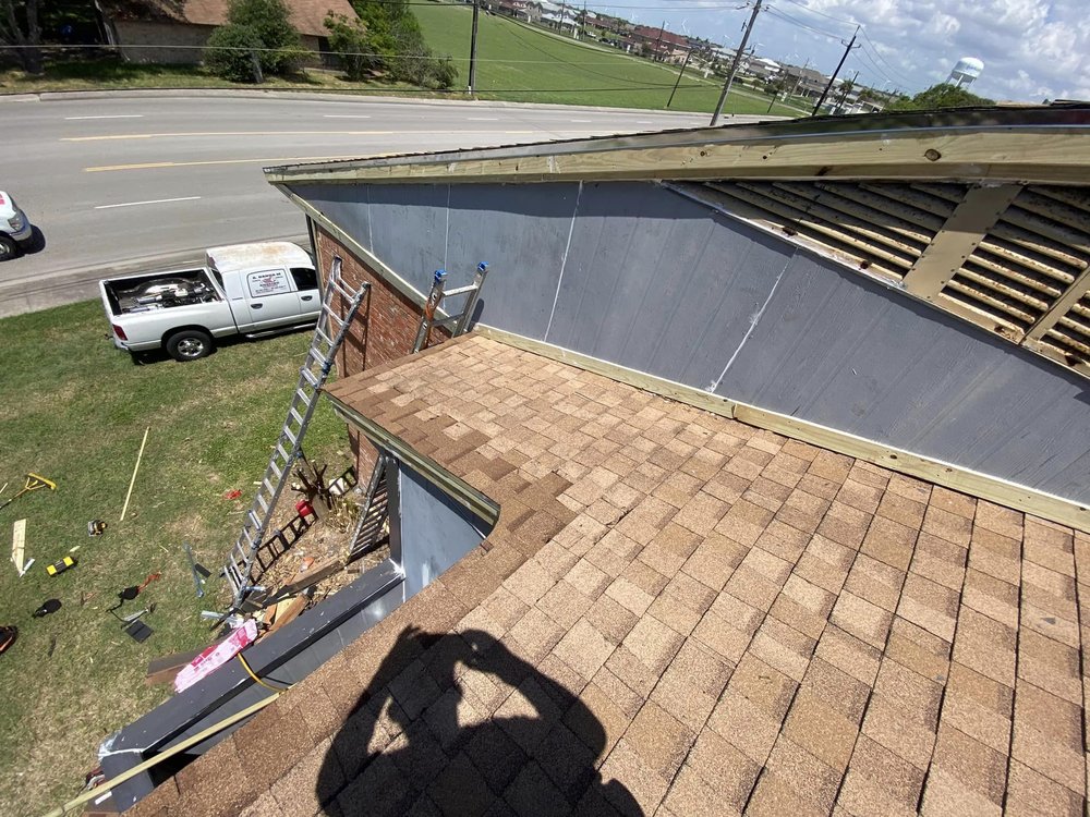 Slide of A Banda M Roofing
