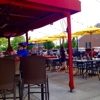 Hamilton's Pub - Covered patio bar and umbrellas cover tables on this lighted patio. - Pubs Near Me - Columbus, Ohio Hamilton's Pub - Covered patio bar and umbrellas cover tables on this lighted patio. - Pubs Near Me - Columbus, Ohio