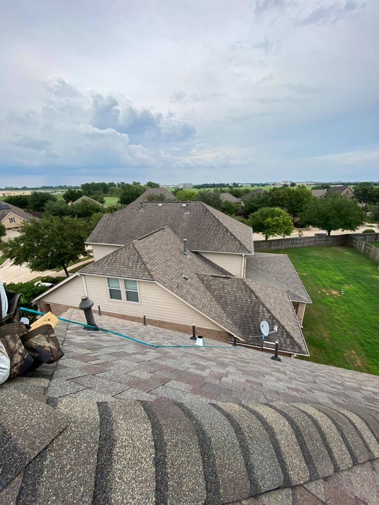 Slide of CM Roofing Pros