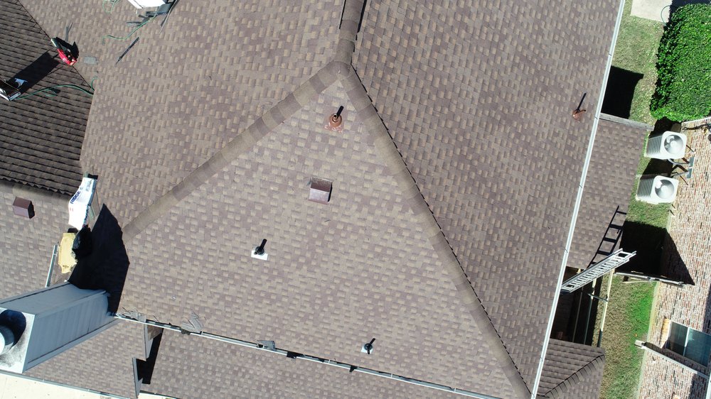 Slide of Qualitas Roofing and Construction