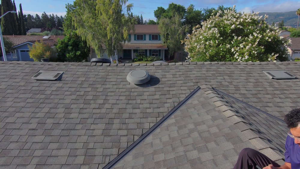 Slide of Neighbor's Roofing