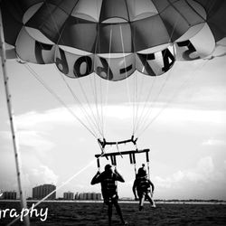 Daytona Beach Parasail - My friend and his daughter as they were being dipped...