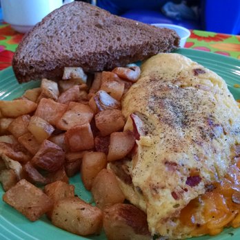 The Flying Biscuit Cafe - The Piedmont omelet with potatoes and toast. - Breakfast & Brunch Near Me - Roswell, Georgia