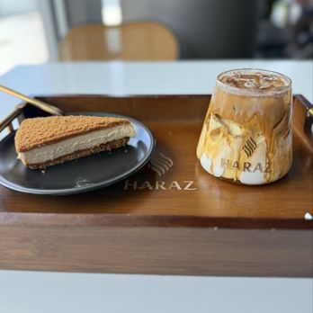 Haraz Coffee House - Biscoff Cheeacake and Iced Haraz Latte - Coffee & Tea Near Me - Charlotte, North Carolina