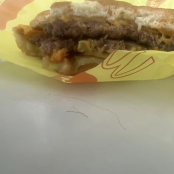 McDonald's - The hair that I pulled out of my mouth while eating this disgusting cheeseburger.. - Fast Food Near Me - Chino, California McDonald's - The hair that I pulled out of my mouth while eating this disgusting cheeseburger.. - Fast Food Near Me - Chino, California