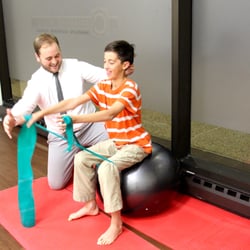 Cornerstone Health - Evanston Chiropractor Dr. Benjamin Fergus uses pediatric chiropractic and pediatric physical therapy to help a boy with his sitting posture.