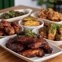 The Jamaican Dumpling Restaurant - Wings : Jerk Wings, Guava Bbq, Garlic Buffalo, Teriyaki, Mango Habanero and Honey Spicy ginger wings.