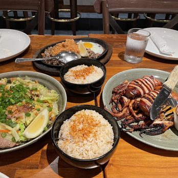 Avenida Restaurant - Part of the food we ordered - garlic rice, sisig, squid and pancit - Filipino Near Me - San Mateo, California