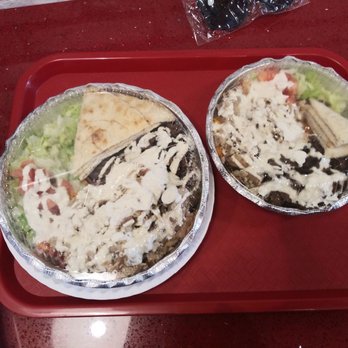 The Halal Guys - Large and small combo platter (checken and beef). - Halal Near Me - Amherst, New York The Halal Guys - Large and small combo platter (checken and beef). - Halal Near Me - Amherst, New York