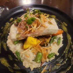 Fire & Water Fish and Chop House - Halibut with seasonal veggies and crispy potatoes on top