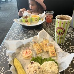 Chicken Salad Chick - Two scoops: Cranberry Kelli & Jalapeño Holly. I love to mix them together:) My daughter loves the Mac & Cheese and Broccoli Salad.