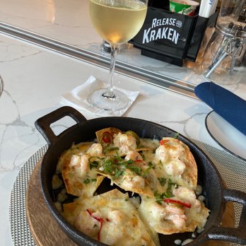 Corvina Seafood Grill - Shrimp nachos with pepper jack cheese and pickled Fresno chilies. On Happy Hour menu too! - Seafood Near Me - Boca Raton, Florida