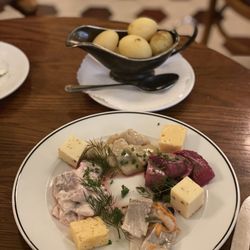 Pelikan - Assortment of herring, cheese, potatoes (225 SEK)