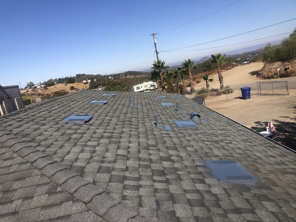 Slide of Escamilla’s Roofing and Rain Gutters