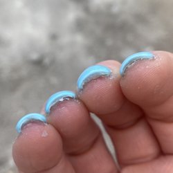 The Gulch Nail Bar - Nails cut so short, glued to the edges with dip then filed to bleed.