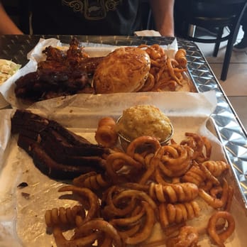 Bombers BBQ - Brisket platter w/curly fries and Mac &cheese in front. Three meat plate in back -burnt ends, ribs , wings, Coleslaw curly fries - Barbeque Near Me - Munster, Indiana Bombers BBQ - Brisket platter w/curly fries and Mac &cheese in front. Three meat plate in back -burnt ends, ribs , wings, Coleslaw curly fries - Barbeque Near Me - Munster, Indiana
