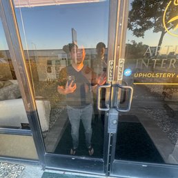 Here, you can see the owner taking a photo of me while I was simply trying to take down the email address.