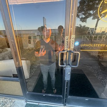 Artisan Interiors - Here, you can see the owner taking a photo of me while I was simply trying to take down the email address. - Furniture Reupholstery Near Me - Sacramento, California