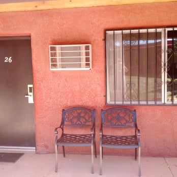 Thunderbird Lodge - Chairs on porch outside room - Hotels Near Me - Chinle, Arizona Thunderbird Lodge - Chairs on porch outside room - Hotels Near Me - Chinle, Arizona