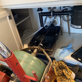 Drain Right Services - Under my sink, running the snake to clean out all that nasty sludge!! - Plumbing Near Me - Gardena, California