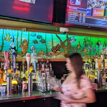 CJ's Club - Stained glass behind the bar. - Sports Bars Near Me - San Diego, California