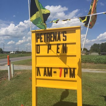 Petrena's Jamaican Grill - a sign for the restaurant - Caribbean Near Me - Tar Heel, North Carolina Petrena's Jamaican Grill - a sign for the restaurant - Caribbean Near Me - Tar Heel, North Carolina