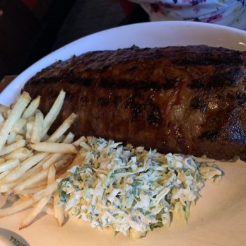 Rutherford Grill - Barbecue Pork Ribs -  Slow-cooked until tender with Texas Hill Country BBQ sauce, Served with coleslaw and French Fries - American Near Me - Rutherford, California
