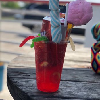 Burger beach hideaway - a red drink with cotton candy - Burgers Near Me - Corpus Christi, Texas Burger beach hideaway - a red drink with cotton candy - Burgers Near Me - Corpus Christi, Texas