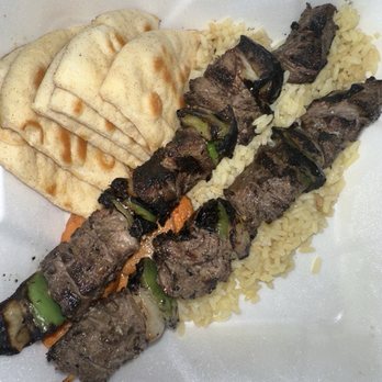 Troy's Greek Restaurant - Steak with Side Rice Pilaf and pita - Greek Near Me - San Diego, California Troy's Greek Restaurant - Steak with Side Rice Pilaf and pita - Greek Near Me - San Diego, California