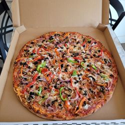 Tahoe’s Pizza - The 24" Pizza is our "Largest" Size, while the 18" is our "Larger" Size.