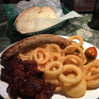 Sonny Noto's Restraunt - steak tips and sausage with onion rings. - Italian Near Me - Wakefield, Massachusetts Sonny Noto's Restraunt - steak tips and sausage with onion rings. - Italian Near Me - Wakefield, Massachusetts
