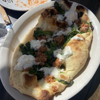Montesacro Marina - Sausage and broccoli pinsa - Italian Near Me - San Francisco, California