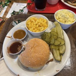 Pulled pork with Mac pickles galore and potato salad Pulled pork with Mac pickles galore and potato salad
