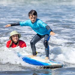 Surf Diva Surf School - Instructor and student at Surf Diva Surf School
