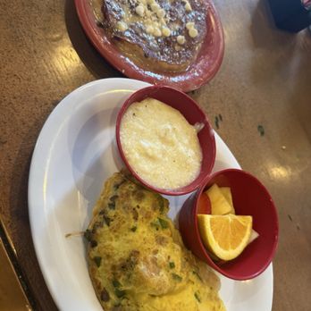 Ruby Slipper Central Business District - Gulf Coast Omelette with White Chocolate Bread Pudding pancake. Eat the pancake with caution!! It's so good! - Breakfast & Brunch Near Me - New Orleans, Louisiana Ruby Slipper Central Business District - Gulf Coast Omelette with White Chocolate Bread Pudding pancake. Eat the pancake with caution!! It's so good! - Breakfast & Brunch Near Me - New Orleans, Louisiana