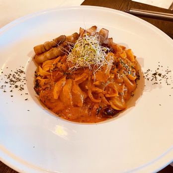Midam Cafe - a pasta dish on a white plate - Korean Near Me - Vancouver, British Columbia Midam Cafe - a pasta dish on a white plate - Korean Near Me - Vancouver, British Columbia