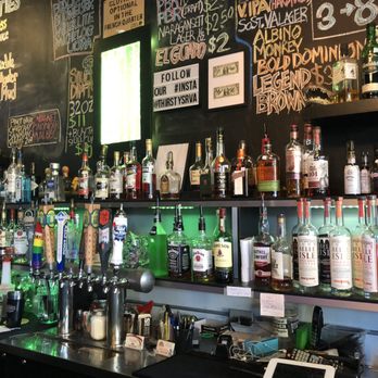 Thirsty's RVA - a variety of liquors on the bar - American Near Me - Richmond, Virginia