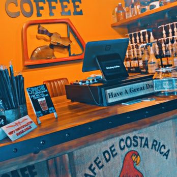 Dirty Dog Coffee - a coffee shop counter with a sign on it - Coffee & Tea Near Me - Drexel, North Carolina