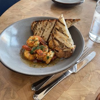 IDOL WOLF - Grilled Argentinian red shrimp over a beautiful blended sauce of olives, oil and garlic served with toasted buttery bread. - Tapas/Small Plates Near Me - Saint Louis, Missouri IDOL WOLF - Grilled Argentinian red shrimp over a beautiful blended sauce of olives, oil and garlic served with toasted buttery bread. - Tapas/Small Plates Near Me - Saint Louis, Missouri