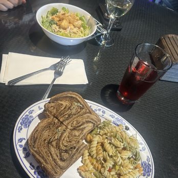 Enoteca - Lunch Chicken Caesar Salad and chicken sandwich with homemade pasta - Bars Near Me - Crescent City, California