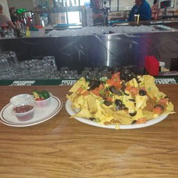 Nachos- comes in Queso and Shredded cheese. $14.50 Nachos- comes in Queso and Shredded cheese. $14.50