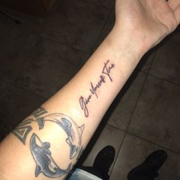 Tattoo left arm: "give yourself time"