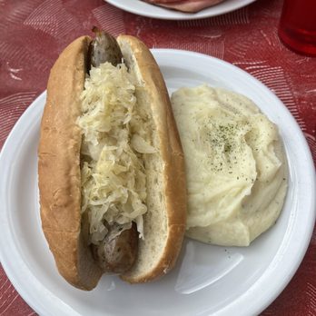The Troll Tavern - Bratwurst on a bun with mashed potatoes - American Near Me - Helen, Georgia The Troll Tavern - Bratwurst on a bun with mashed potatoes - American Near Me - Helen, Georgia