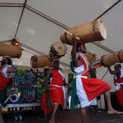 RAKATAK - I don't want to know how heavy these drums must be ... but they carry & play them effortlessly!
