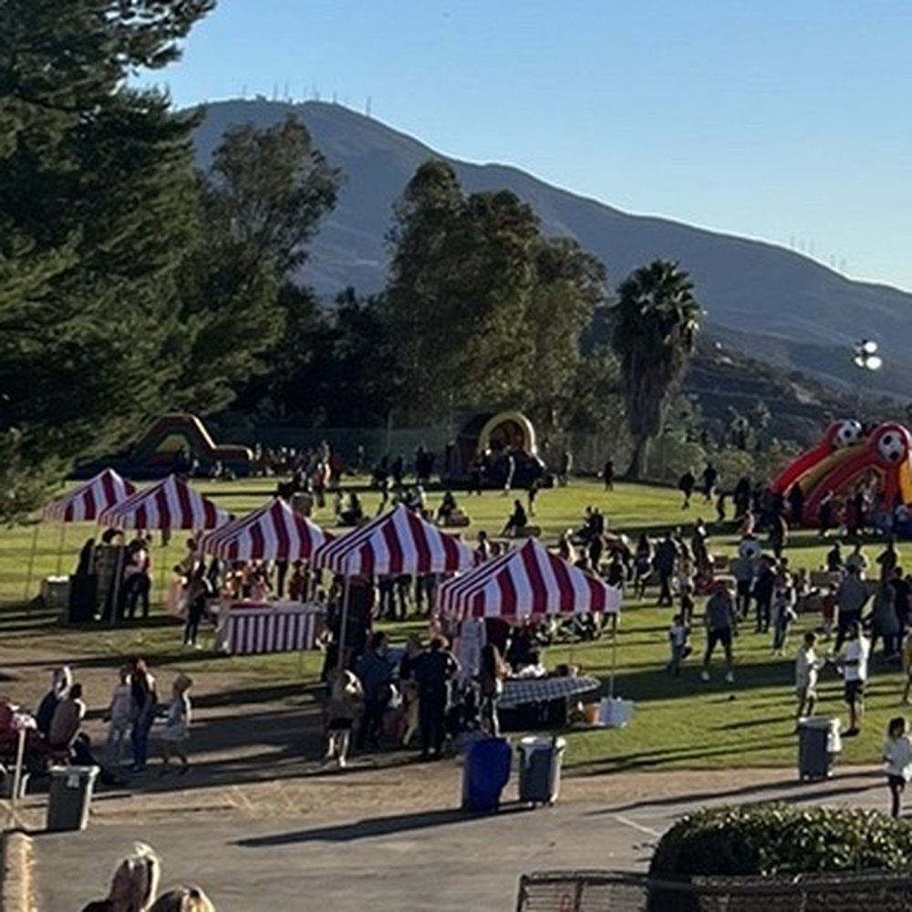 The red and white tents and carnival games inside were perfect. The red and white tents and carnival games inside were perfect.