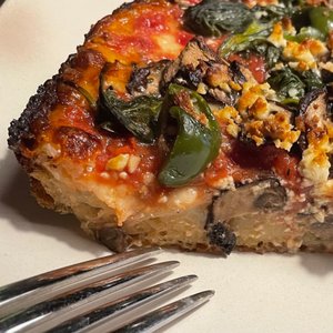 Photo of Breezy Town Pizza - Seattle, WA, United States. no skimping on ingredients or deep dish factor.