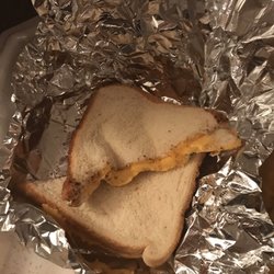 E Wing House - So called "grilled cheese" that is barely cooked... which they claimed was why it took over 50 minutes to get the order